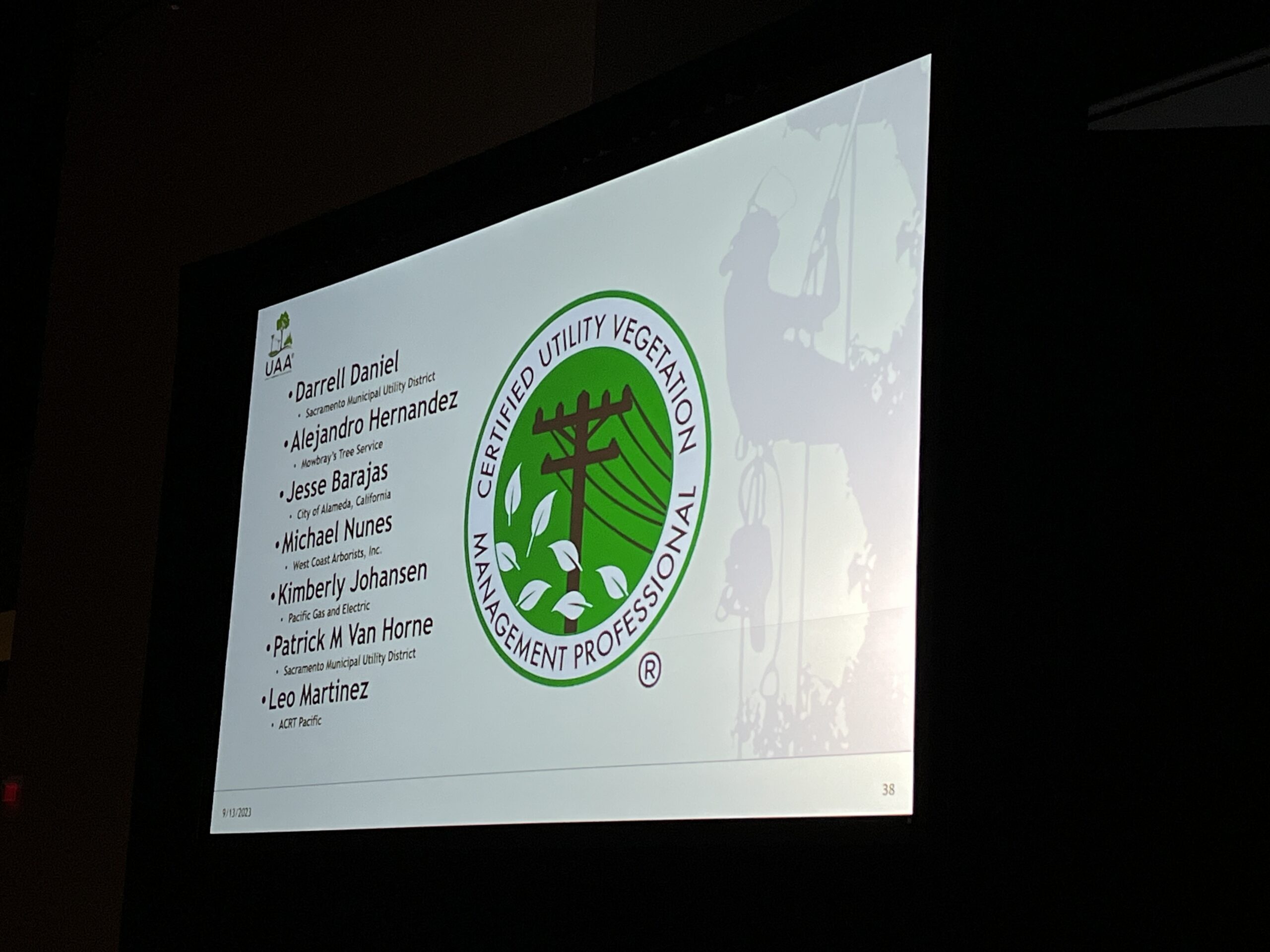 A conference slide displays the Certified Utility Vegetation Management Professional logo and a list of recognized individuals.